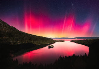 beautiful photo of emerald bay at night with aurora lights in the sky